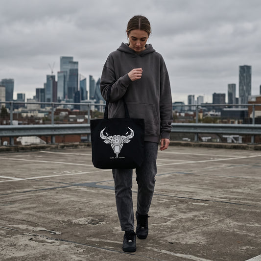 Taurus — Hold The Line tote bag — model carrying the black organic cotton pickleball tote bag