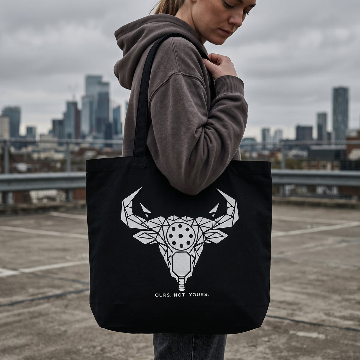 Taurus — Hold The Line tote bag — close-up of the black pickleball tote bag on the shoulder