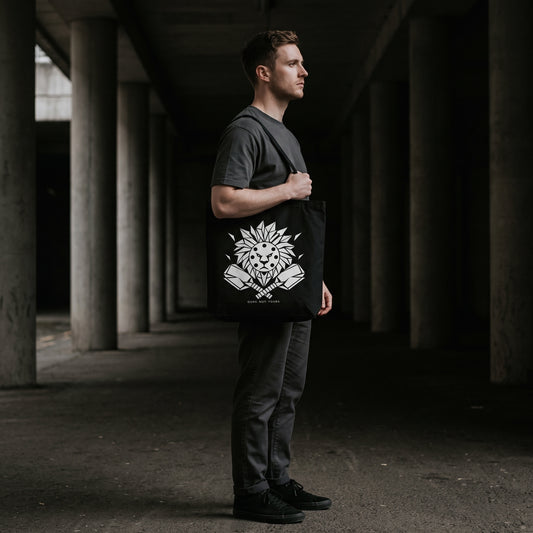 Leo — Centre Court tote bag — model carrying the black organic cotton pickleball tote bag