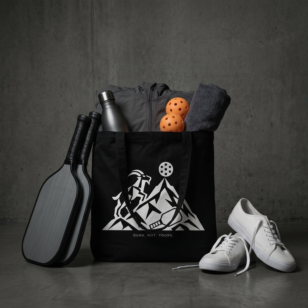 Capricorn — The Top Is Taken tote bag — black pickleball tote bag packed with paddles, balls and kit courtside