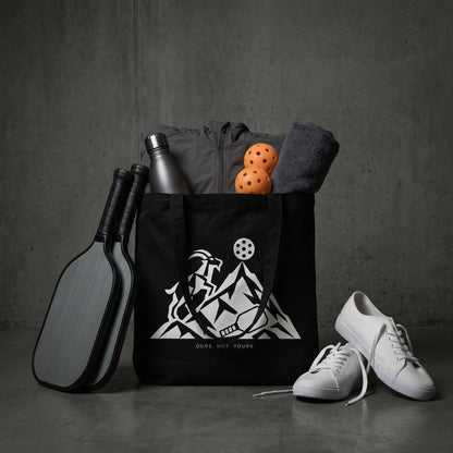 Capricorn — The Top Is Taken tote bag — black pickleball tote bag packed with paddles, balls and kit courtside