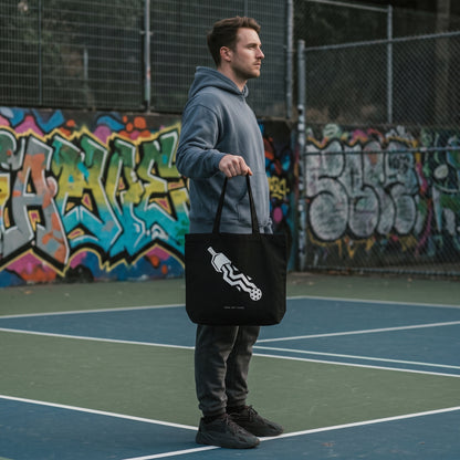 Aquarius — Disrupt The Flow tote bag — model carrying the black organic cotton pickleball tote bag